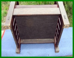 View of the bottom of the chair, showing the excellent condition of the bottom of the legs and the crisp original bevel of the feet.